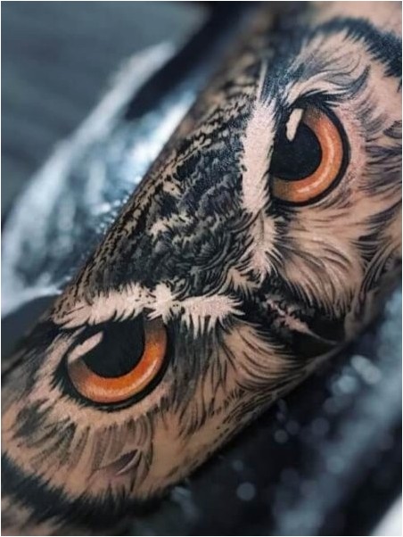 Татуировка с совиными глазами