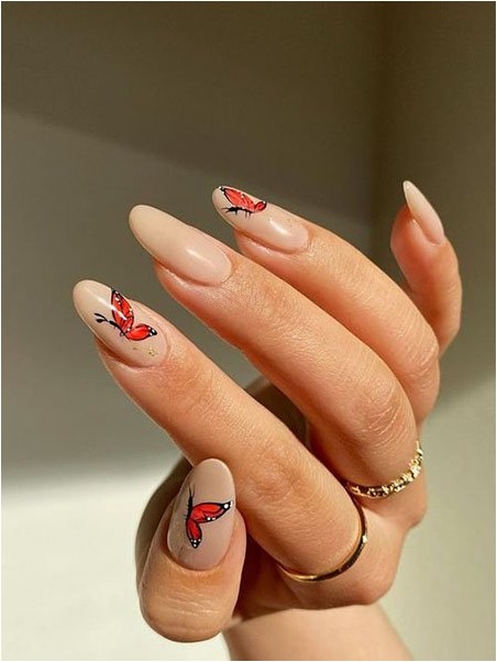 Длинные овальные ногти с изображением бабочек